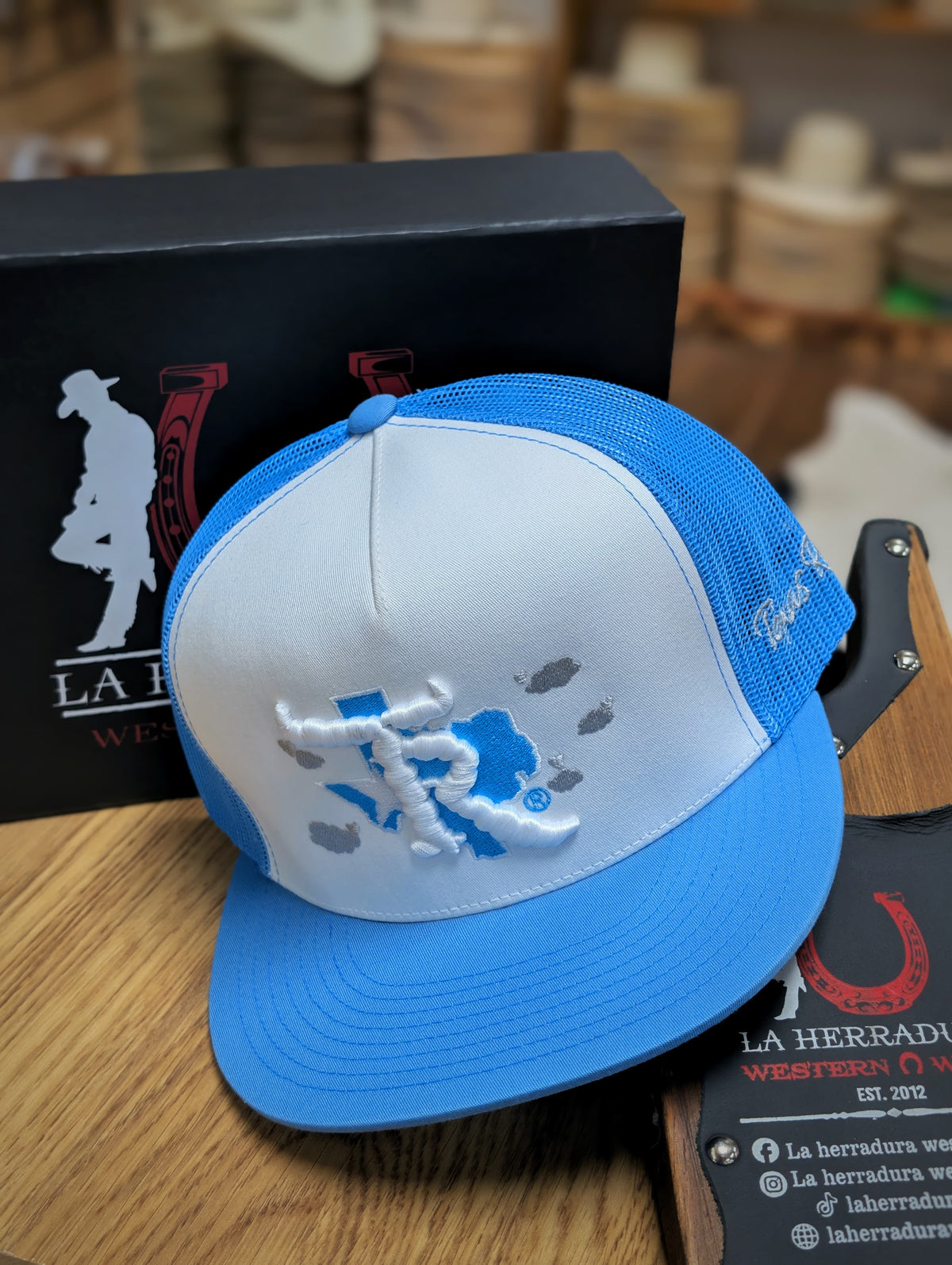 TEXAS RANCH CAP BLUE AND WHITE BLUE LOGO