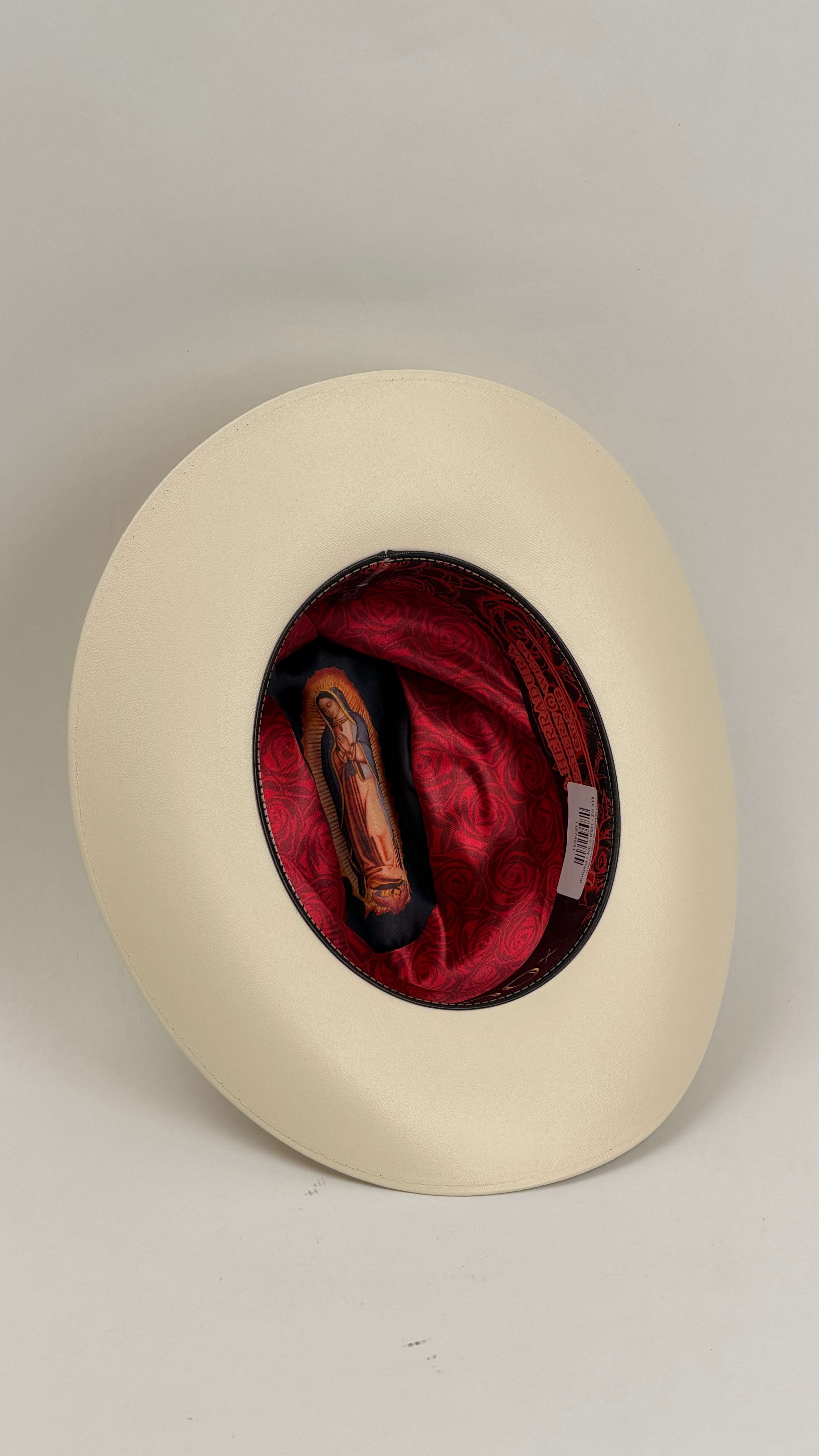 White cowboy hat with red interior