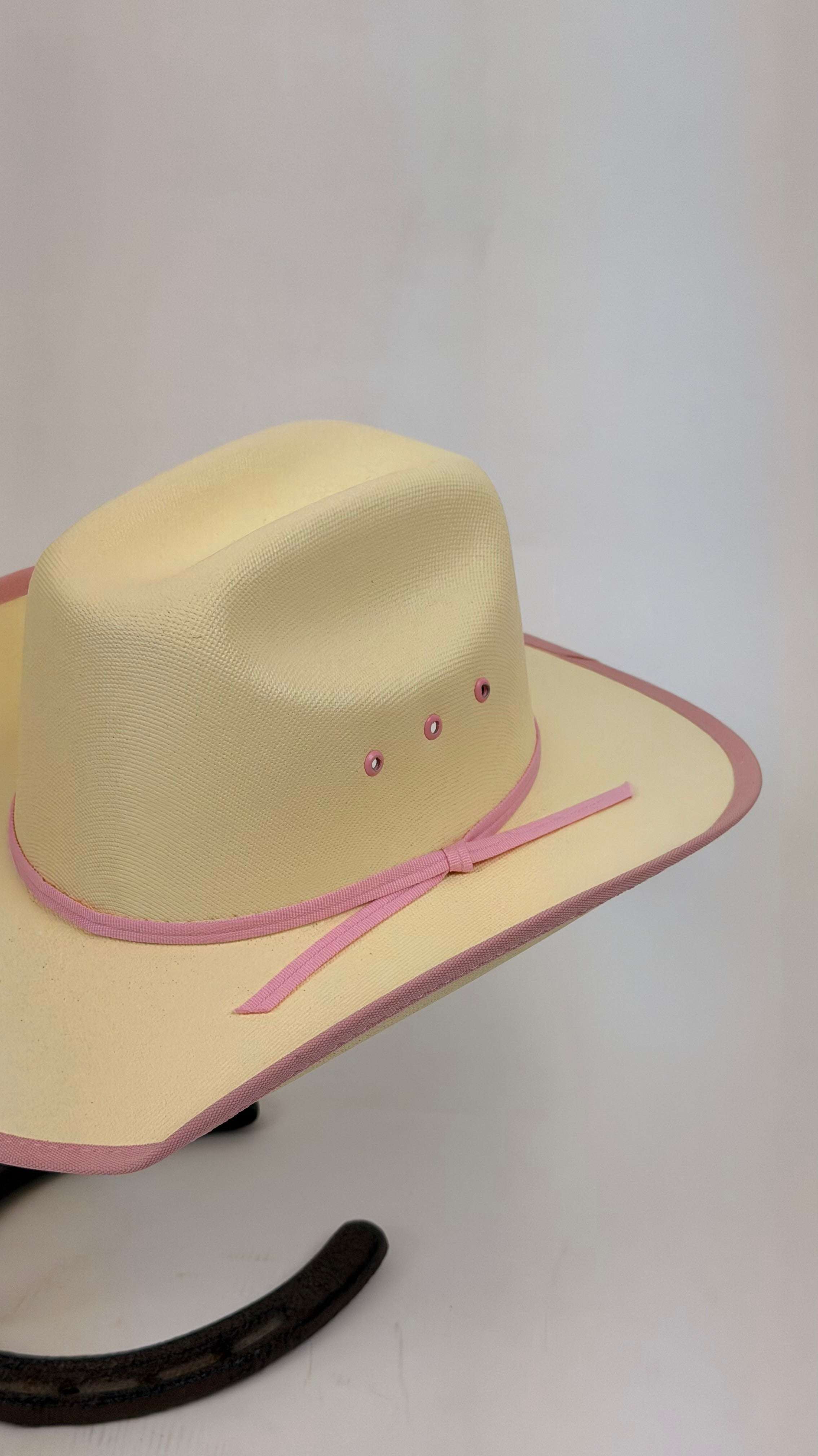 Beige cowboy hat with pink band
