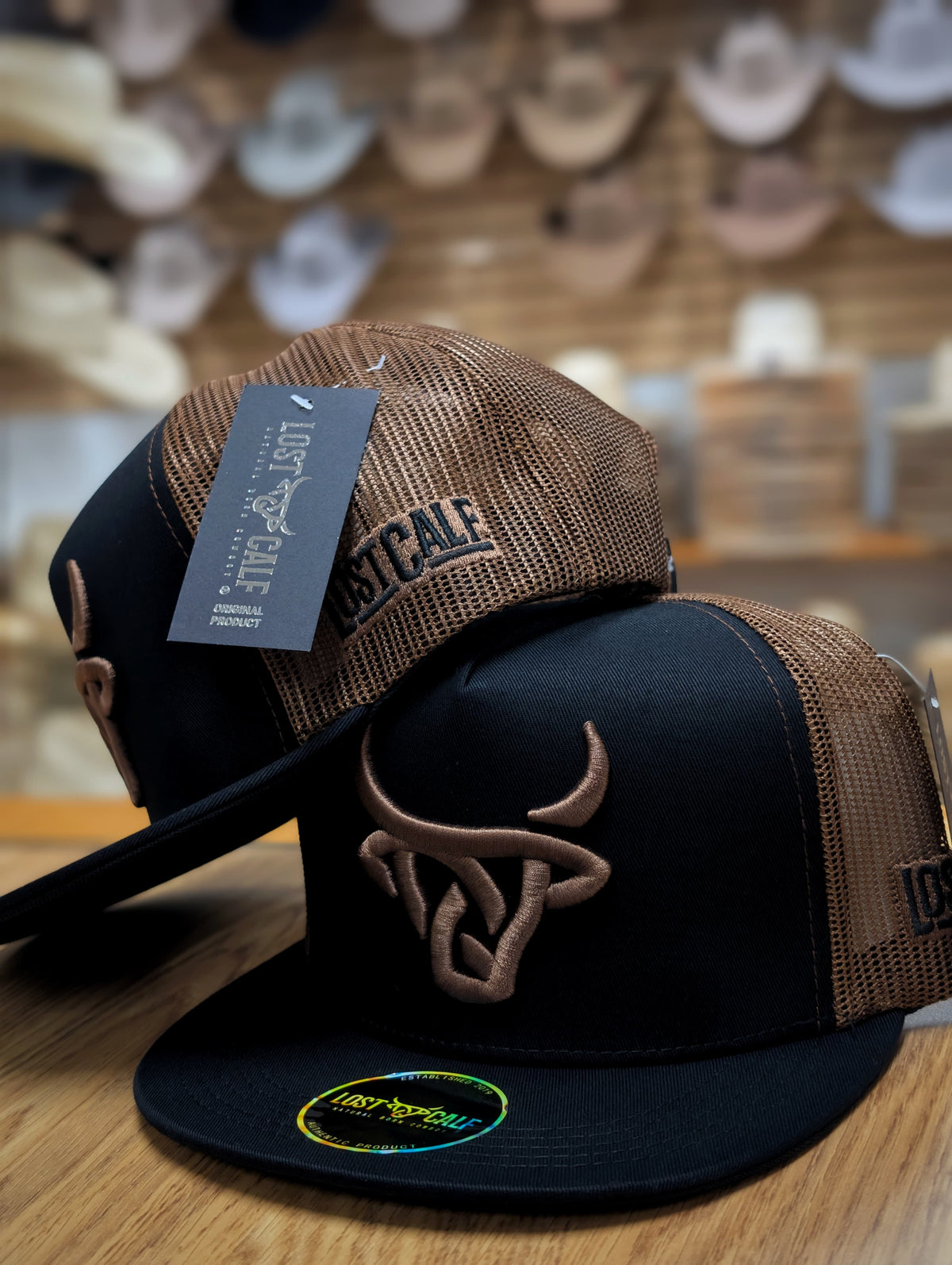LOST CALF HACK FLAT BILL TRUCKER HAT