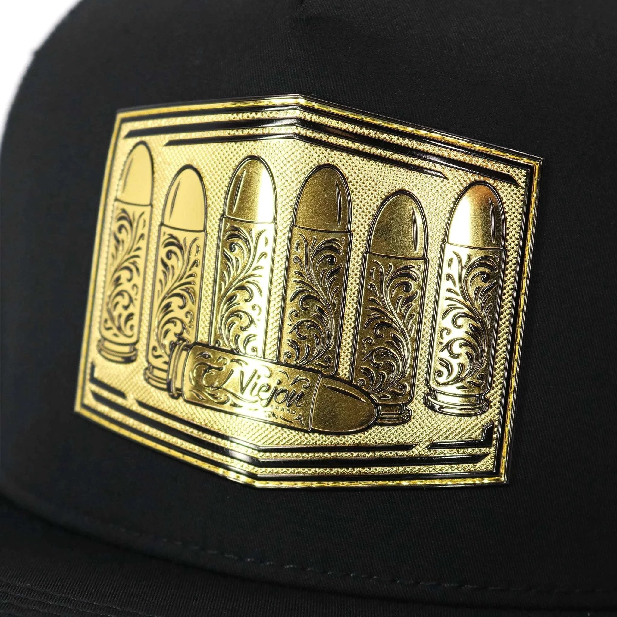 Black cap with a gold decorative emblem