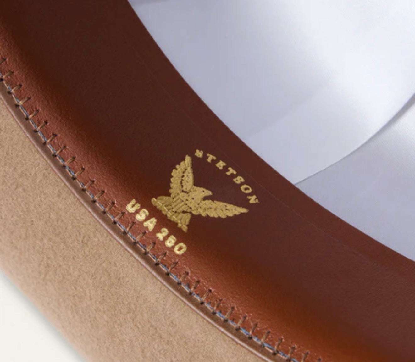 Close-up of a leather-bound book with 'Teton' branding