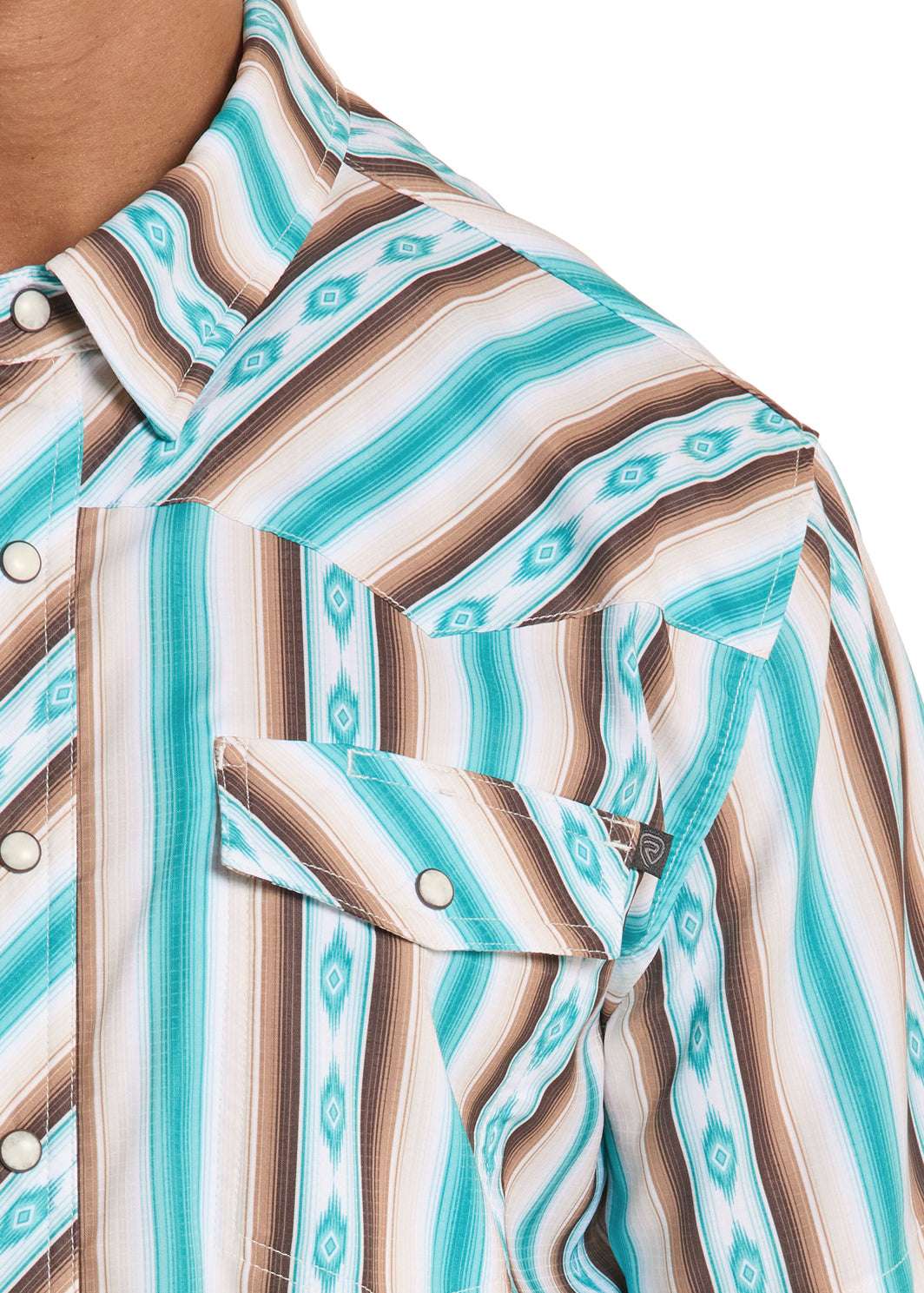 Close-up of a patterned shirt with turquoise, brown, and beige stripes.
