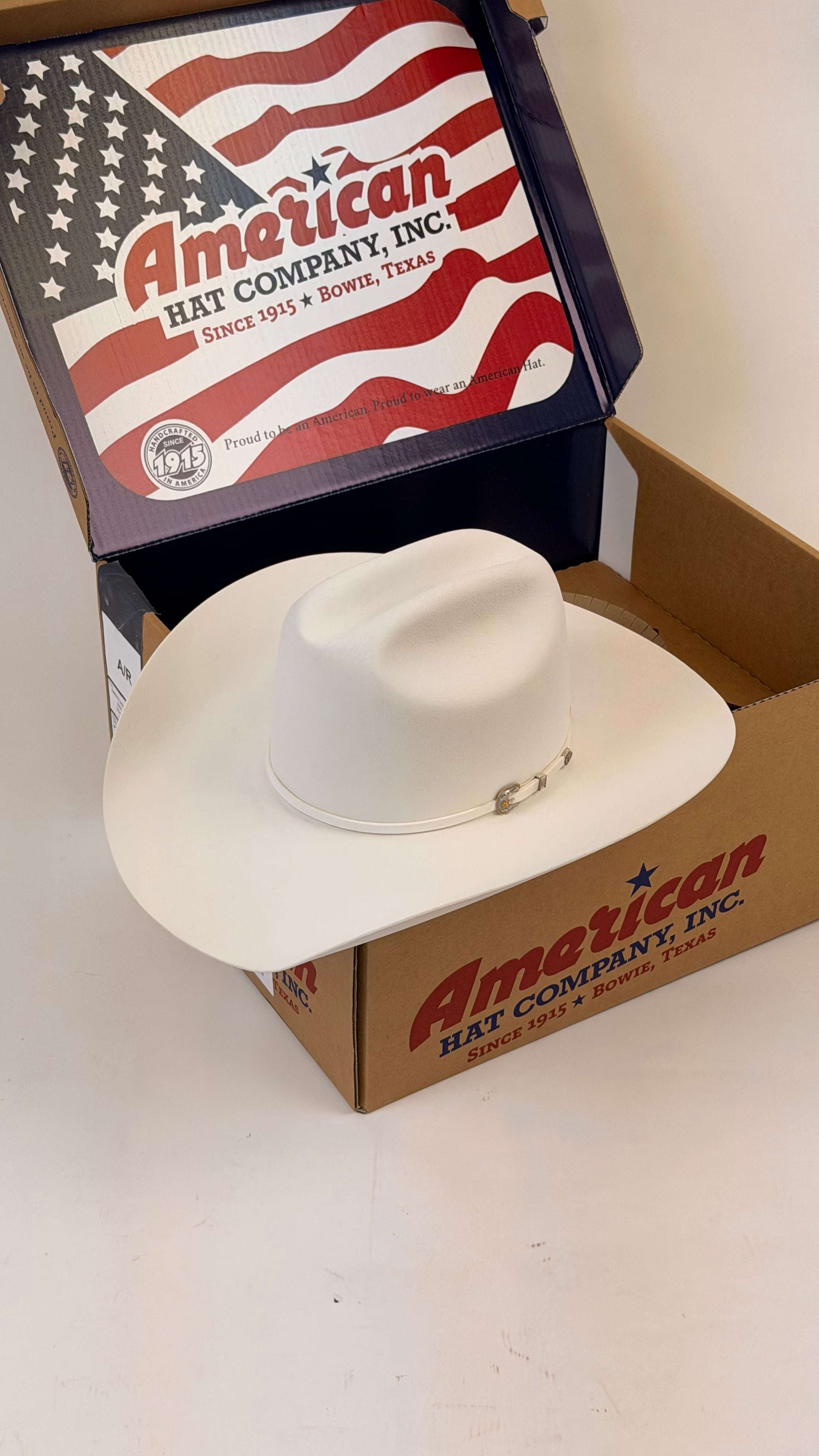White cowboy hat in an American Hat Company box