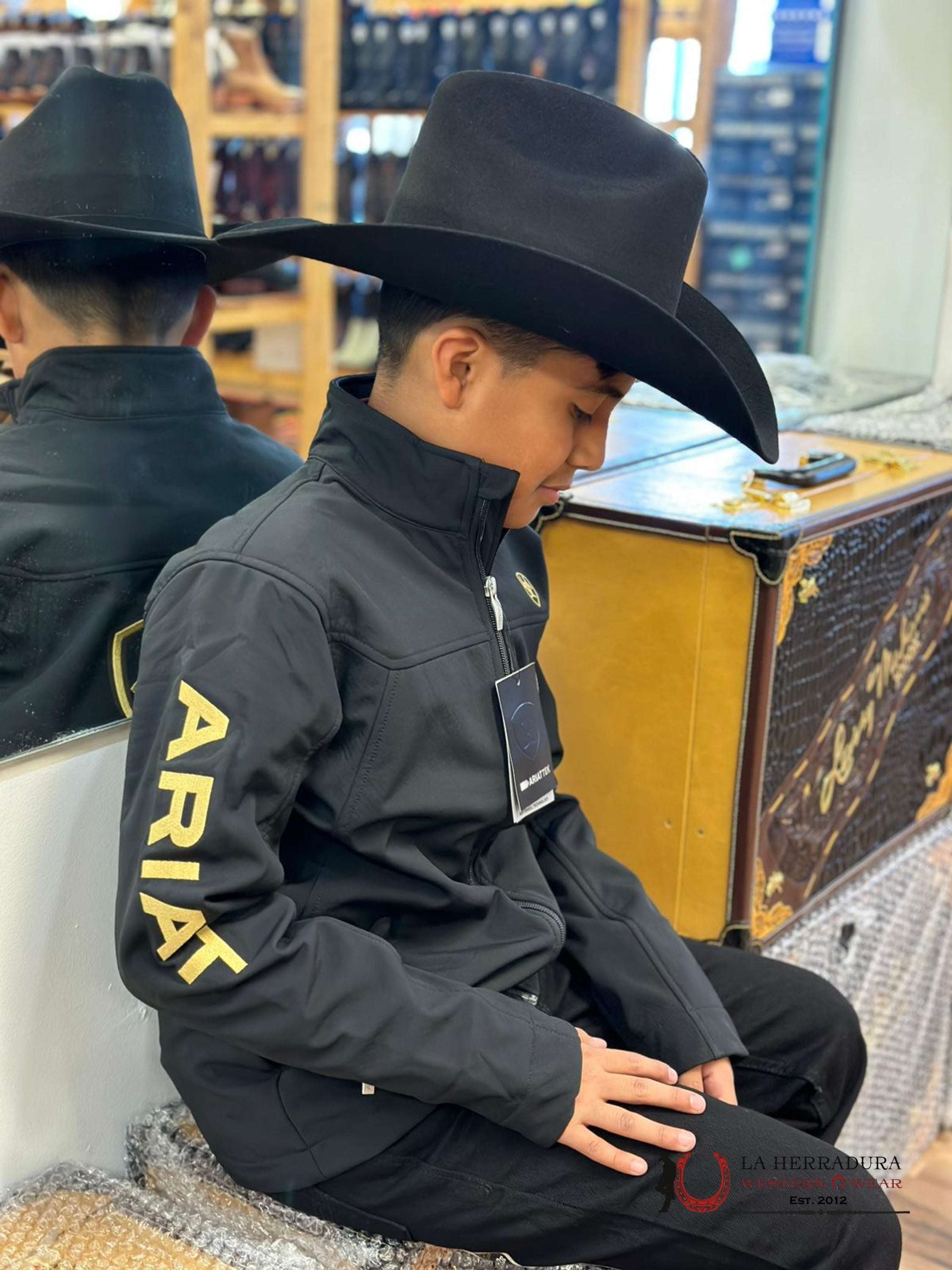 Ariat Youth Soft Shell Jacket Team Logo Black Gold Niños
