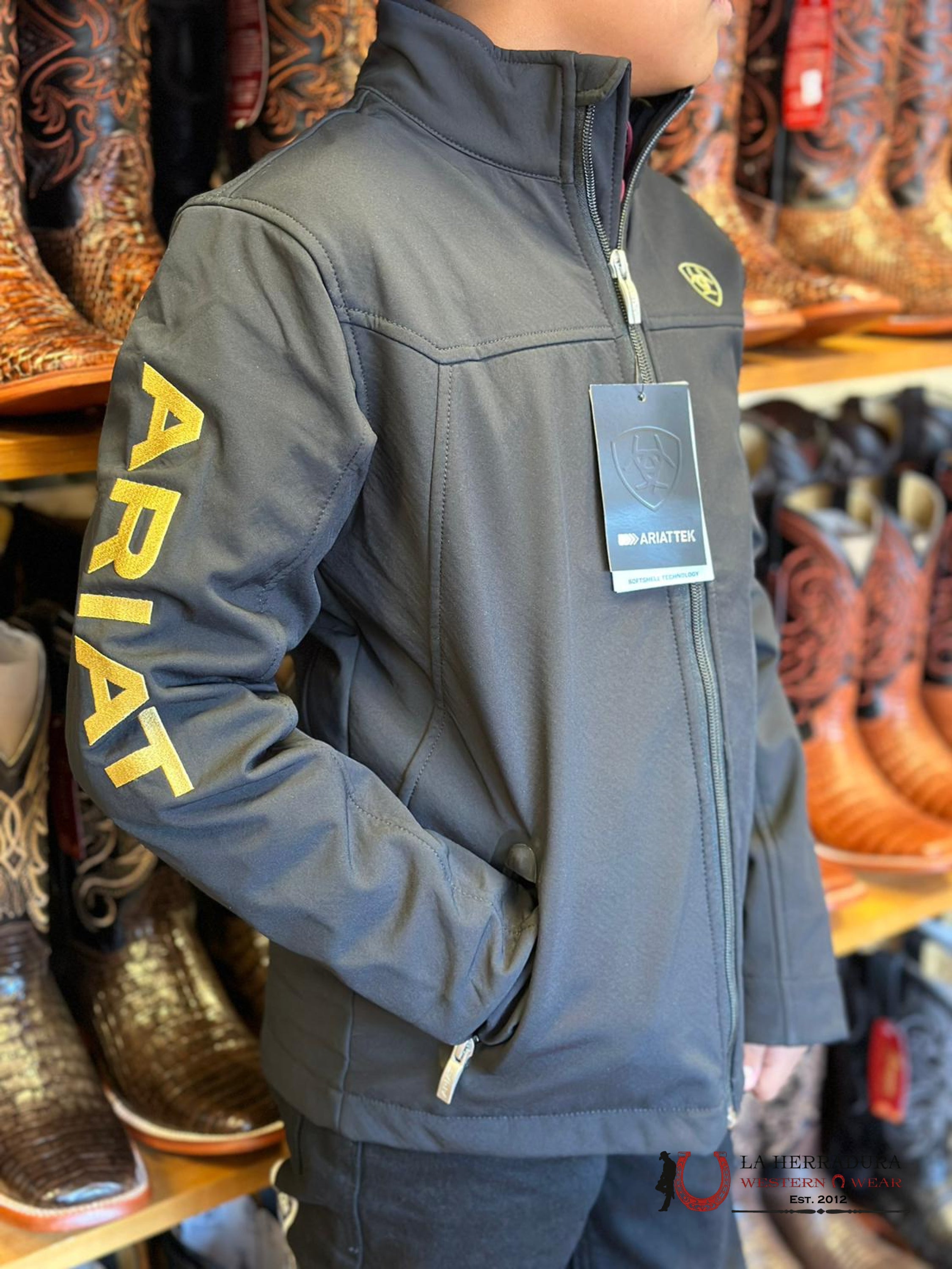 Ariat Youth Soft Shell Jacket Team Logo Black Gold Niños