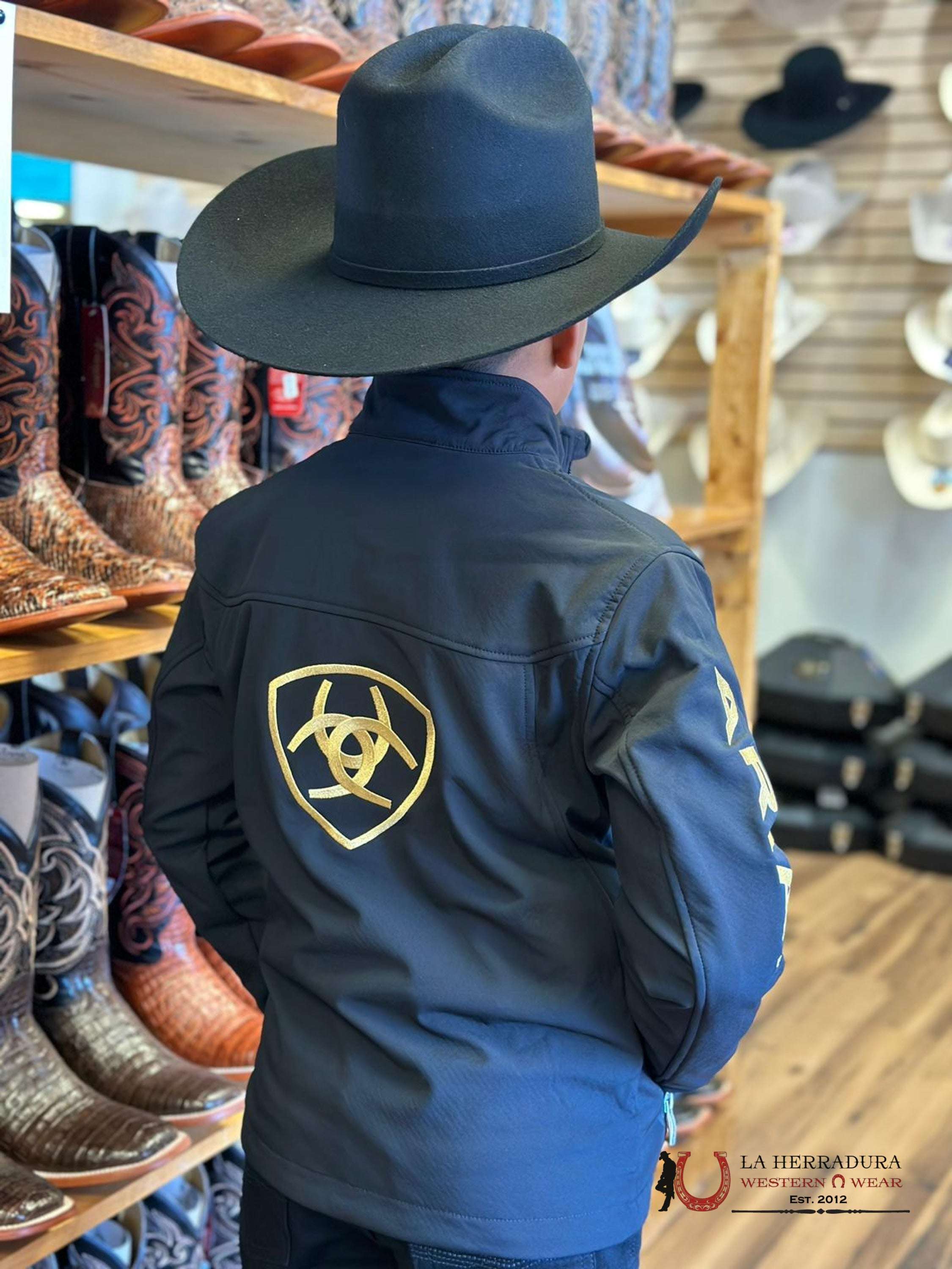 Ariat Youth Soft Shell Jacket Team Logo Black Gold Niños