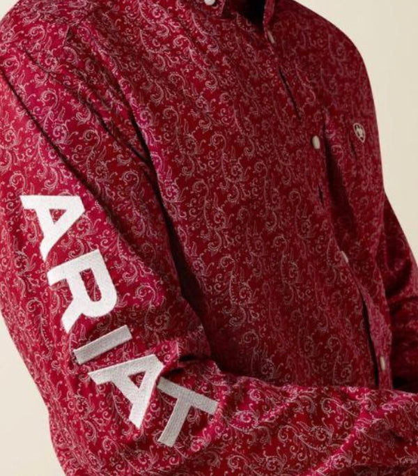 CAMISA ARIAT DE MANGA LARGA TEAM DYLAN PARA HOMBRE ROJA CON ESTAMPADO DE VOLUTAS/BLANCA 10073628