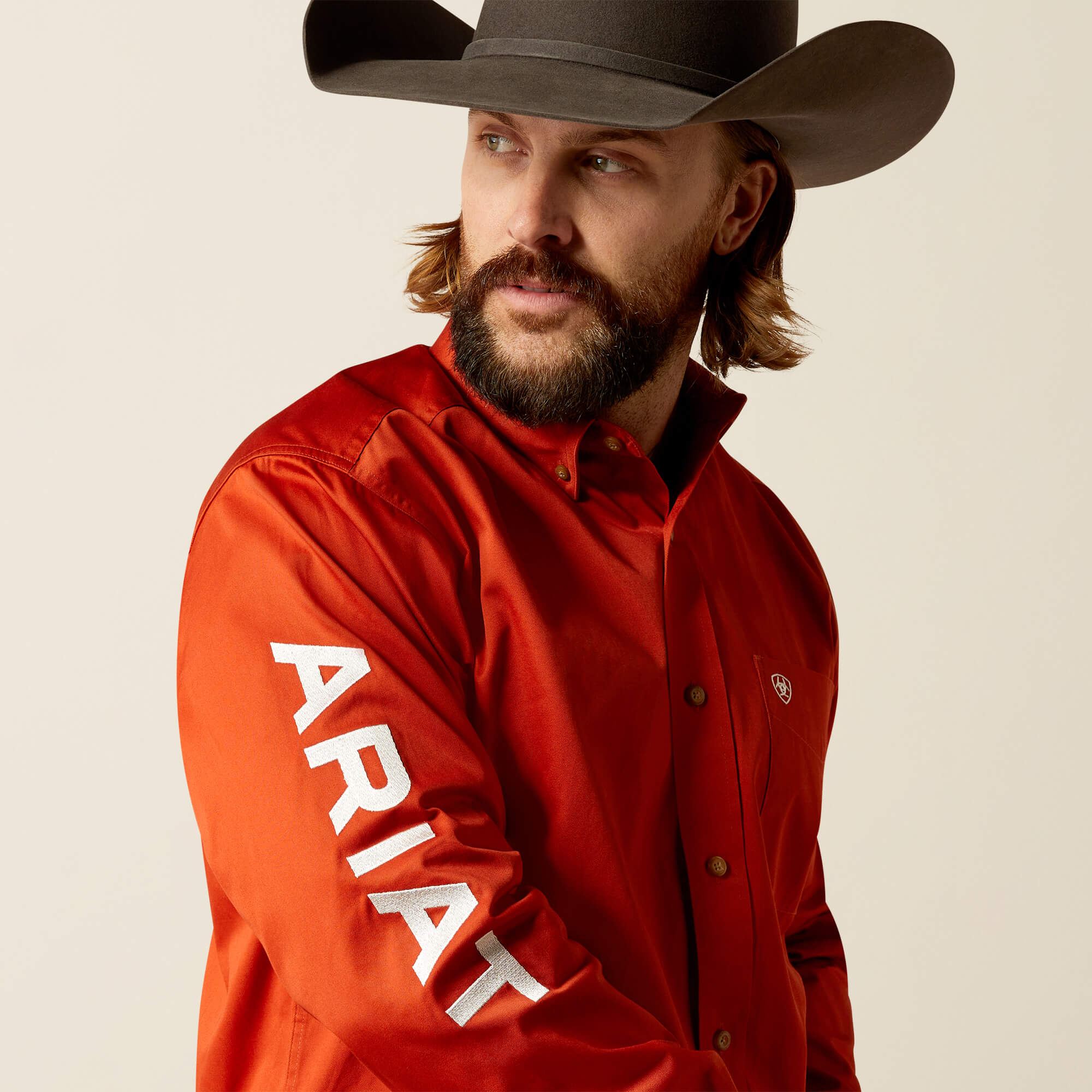 ARIAT CLASSIC TEAM LOGO DARK ORANGE LONG SLEEVE SHIRT