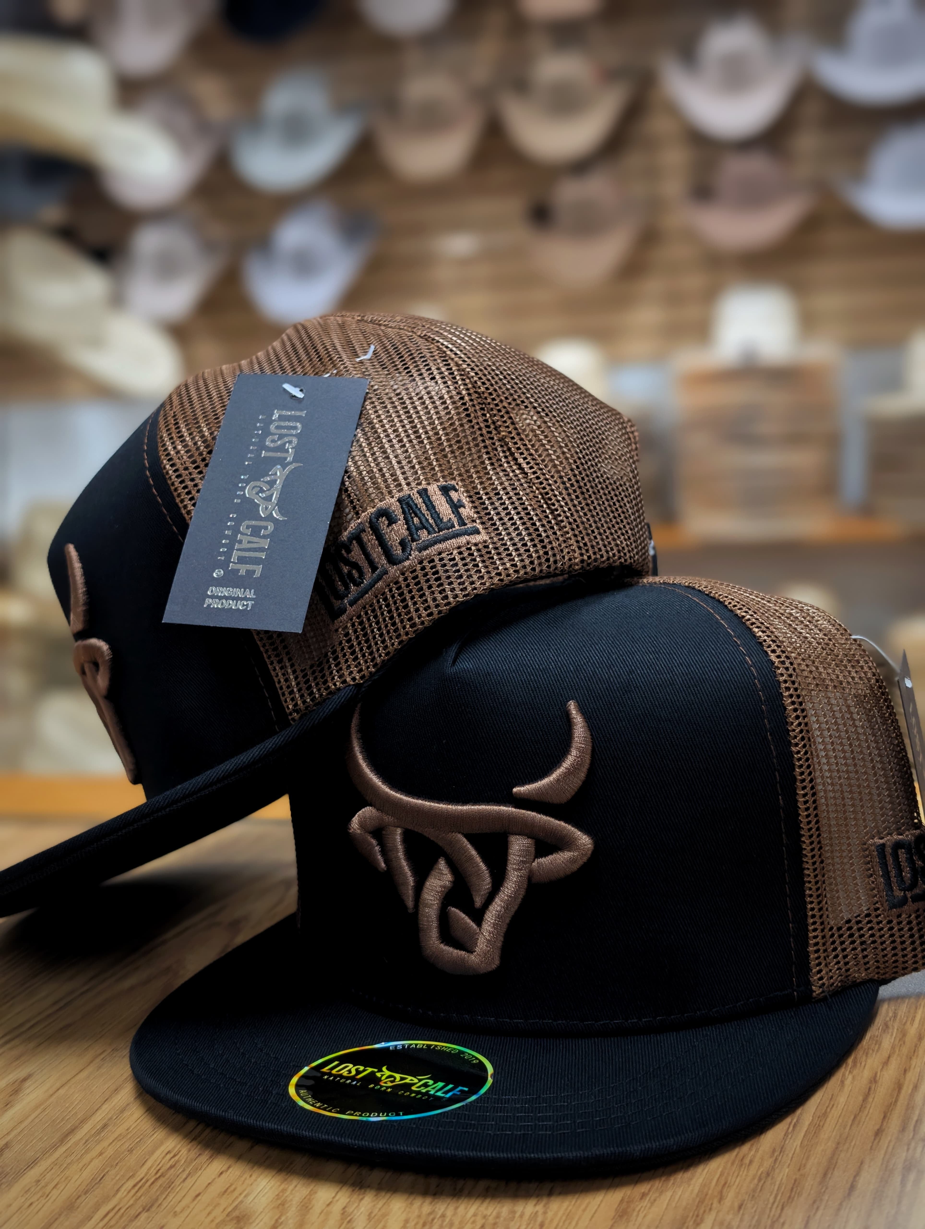 LOST CALF HACK FLAT BILL TRUCKER HAT