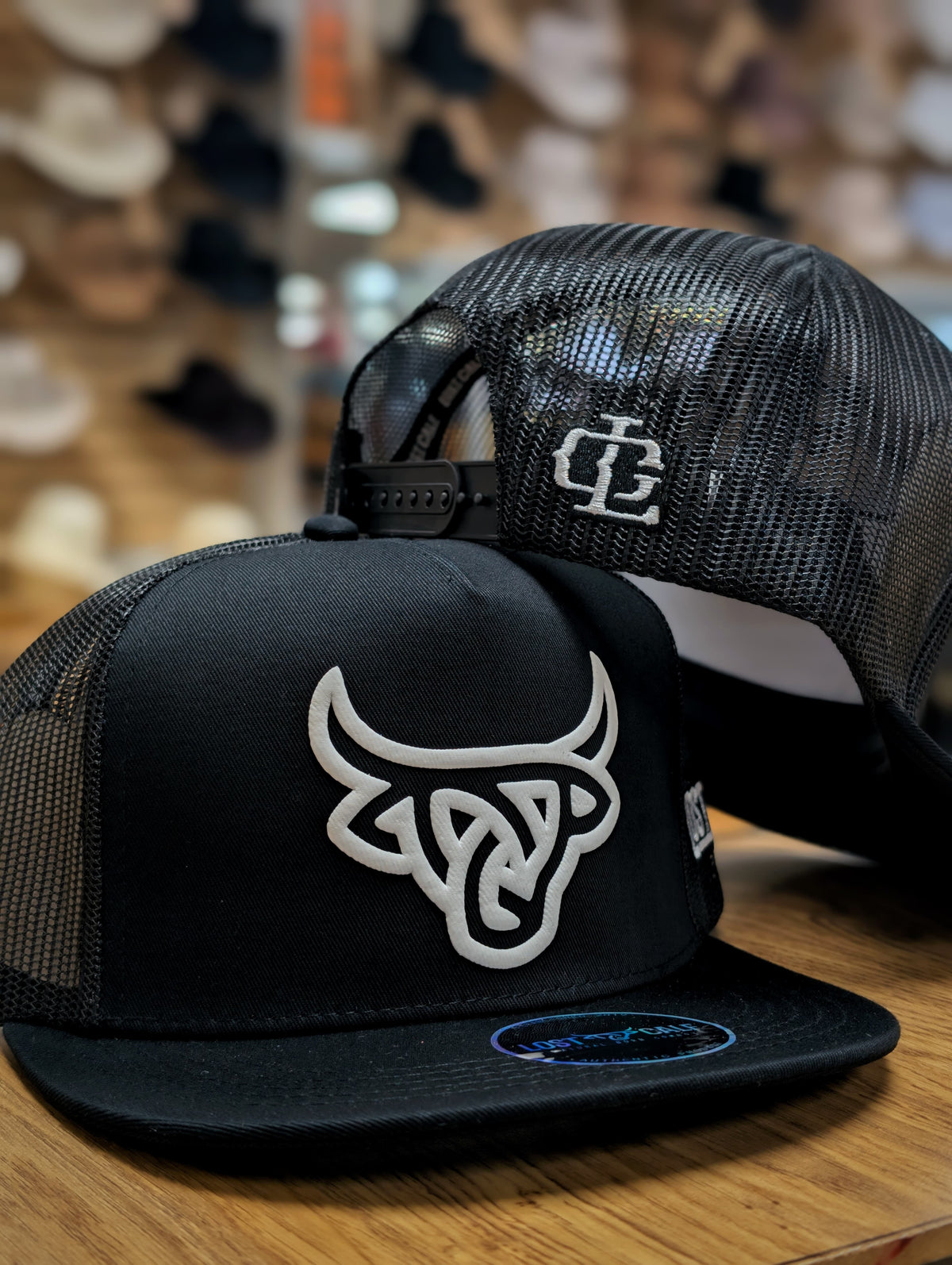 LOST CALF ECLIPSE FLAT BILL TRUCKER HAT