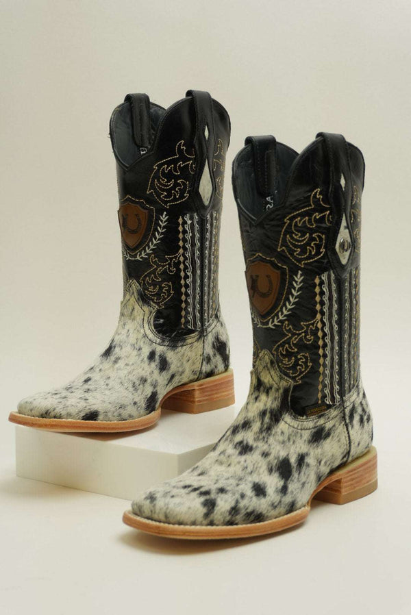 LA HERRADURA BOTAS VAQUERAS PARA HOMBRE DANIEL CON PIEL DE VACA CON PELO PINTADO DE NEGRO Y FRANJAS NATURALES (CADA PAR ES ÚNICO)