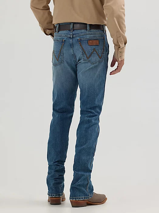 WRANGLER RETRO SLIM BOOT MIDWASH