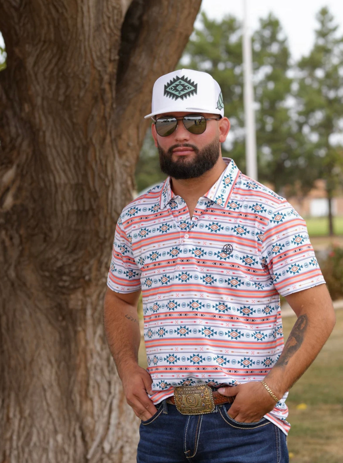 CUERO LINE MEN’S ORANGE STRIPED AZTEC POLO