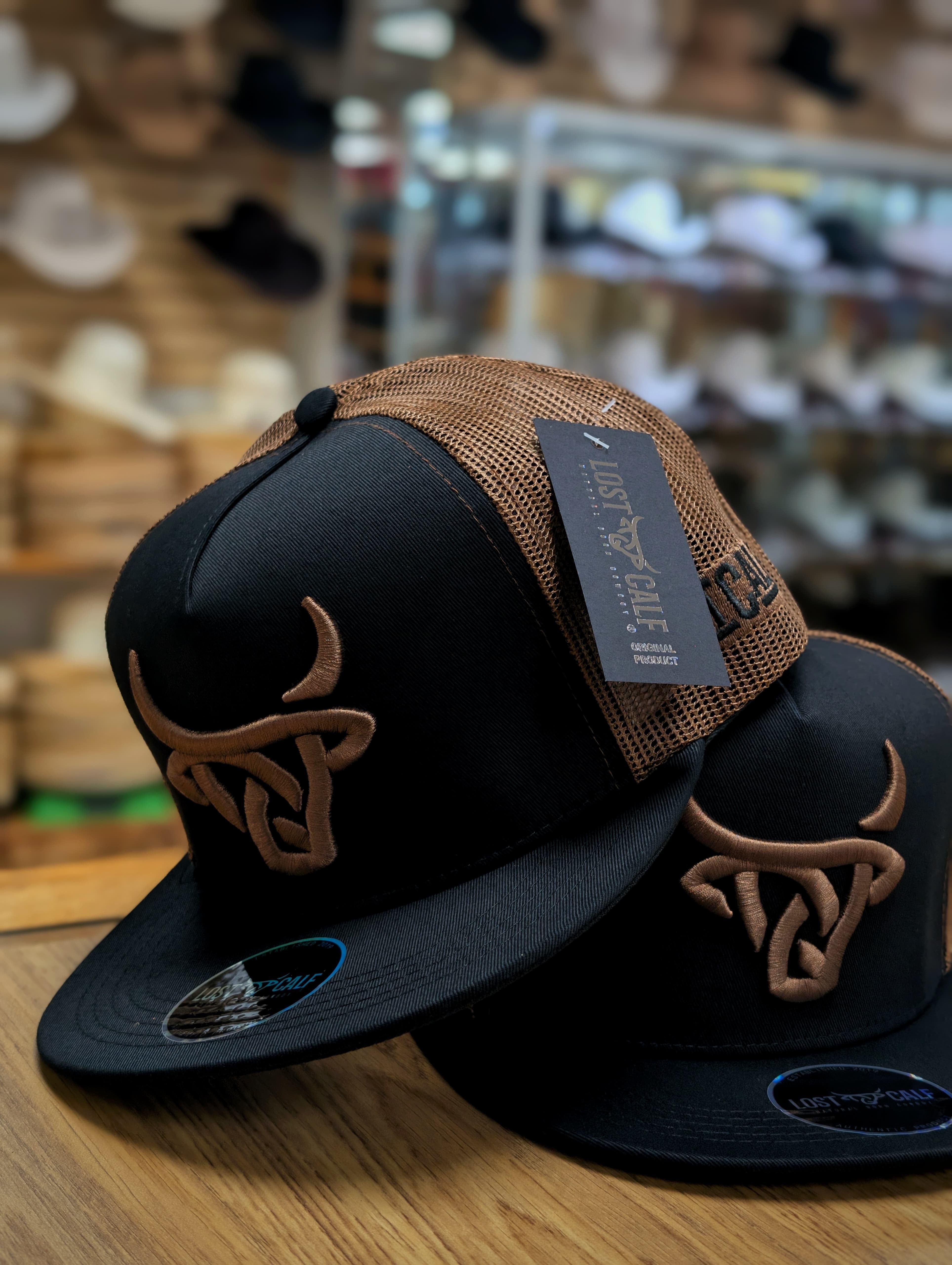 LOST CALF HACK FLAT BILL TRUCKER HAT