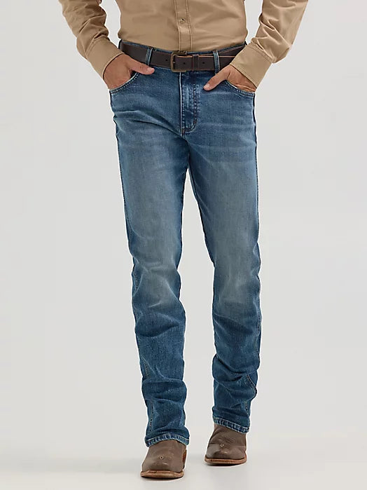 WRANGLER RETRO SLIM BOOT MIDWASH