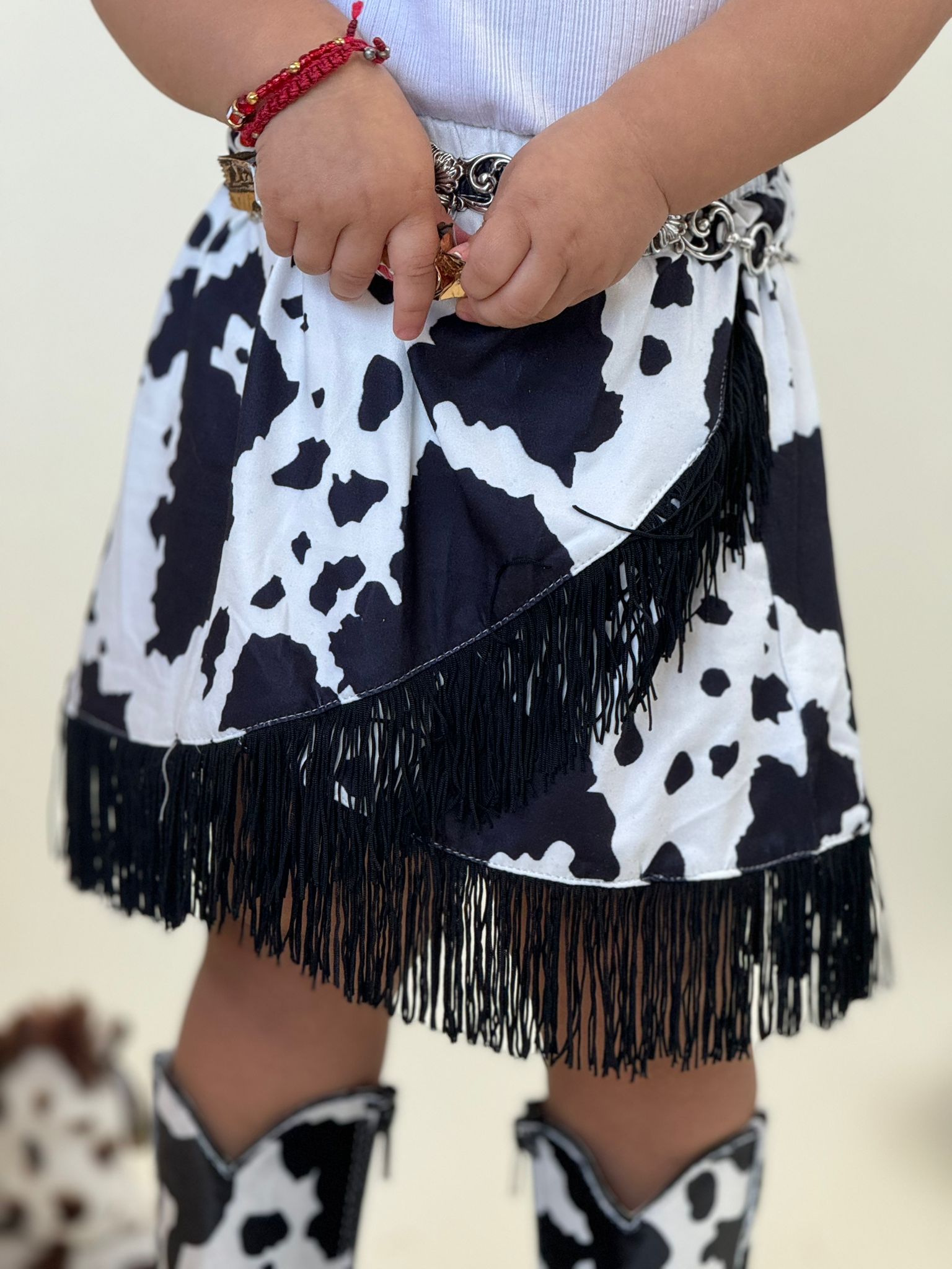 SHEA BABY BLACK COW PRINT FRINGE SKIRT TODDLER