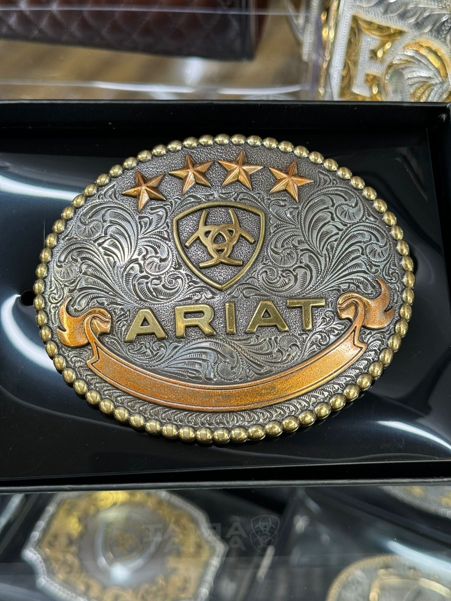 ARIAT ROUND BRONZE STARS SILVER BUCKLE