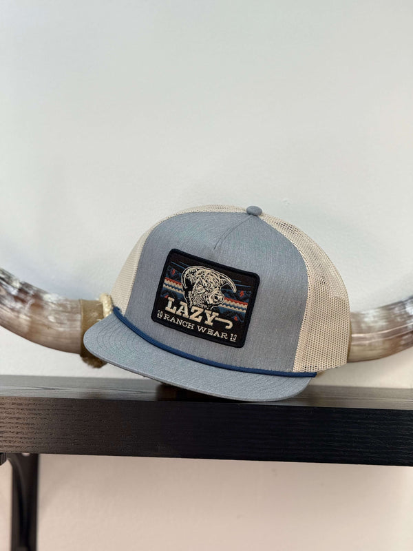 GORRA AZUL LAZY J CON BEIGE