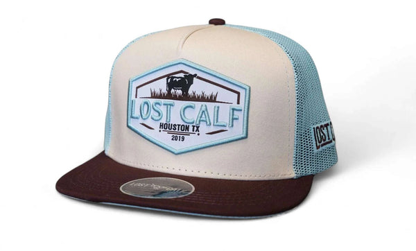 Becerro perdido, gorra tímida, azul con marrón.
