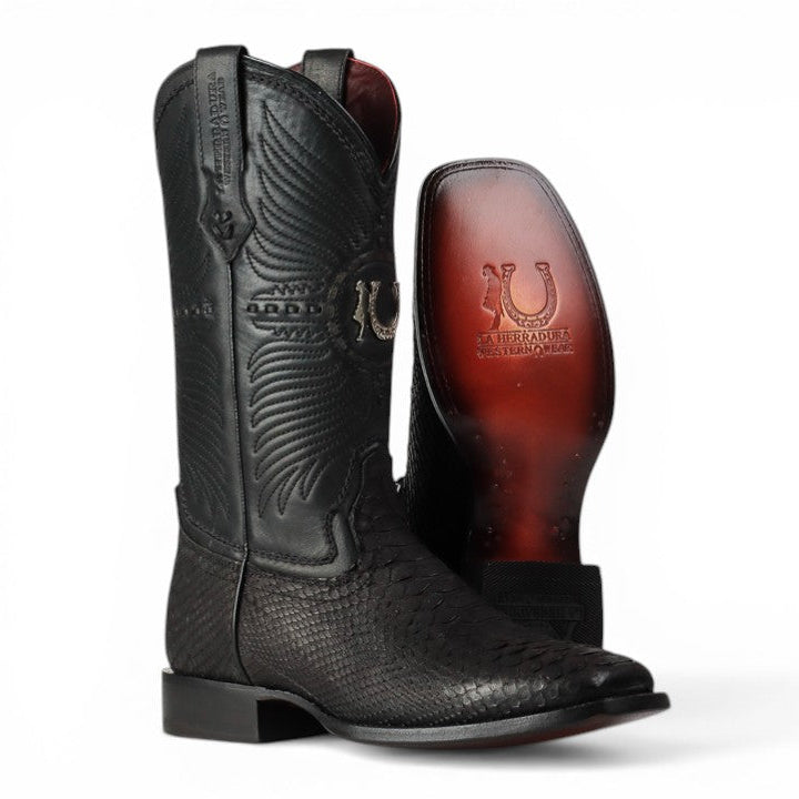 Black and brown cowboy boots with a visible brand logo on a white background