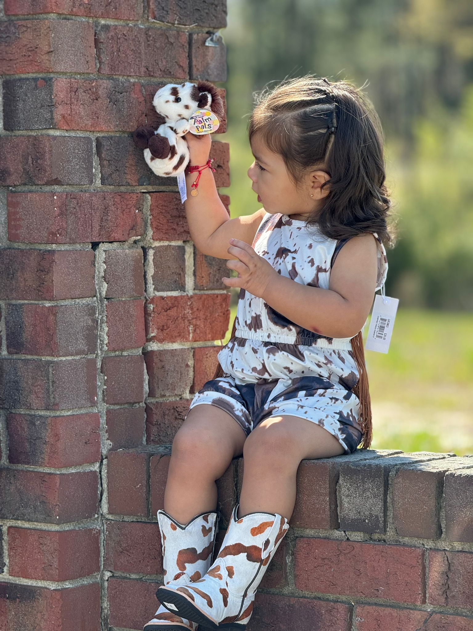 SHEA BABY COWPRINT ONSIE FRINGE BROWN