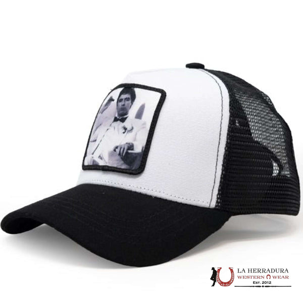 GORRA TRUCKER ESTRELLA DORADA NEGRA / BLANCA
