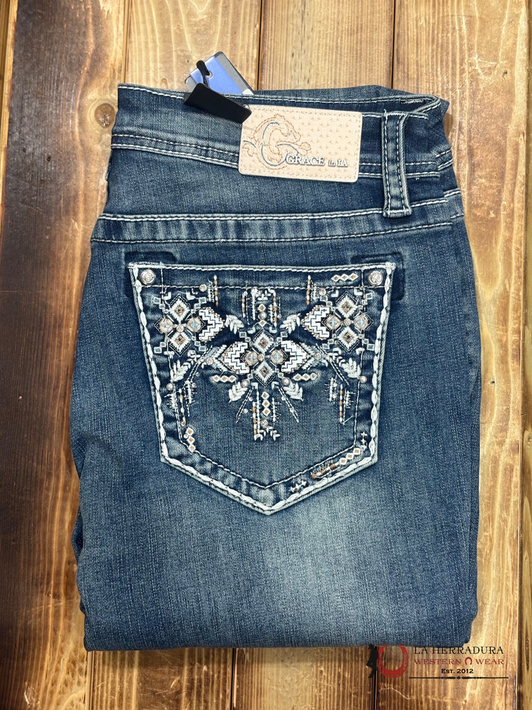 GRACE IN LA WOMEN’S LIGHT WASH LINE DIAMOND AZTEC POCKET EASY FIT BOOT CUT JEANS EB51732