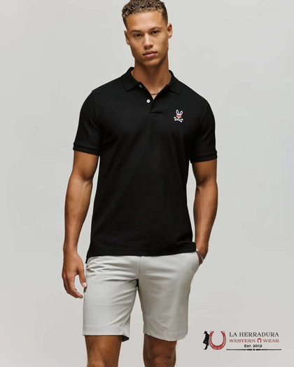 POLO PIQUÉ DE HOMBRE PSYCHO BUNNY MISCHIEF BUNNY NEGRO HL24