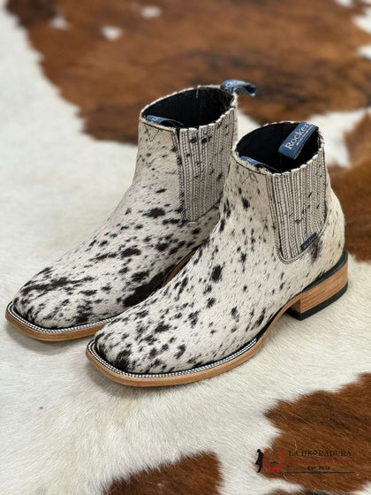 BOTA CORTA DE PIEL DE VACA BLANCA Y NEGRA CON PUNTA CUADRADA PARA HOMBRE ROCK'EM (CADA PAR ES ÚNICO)