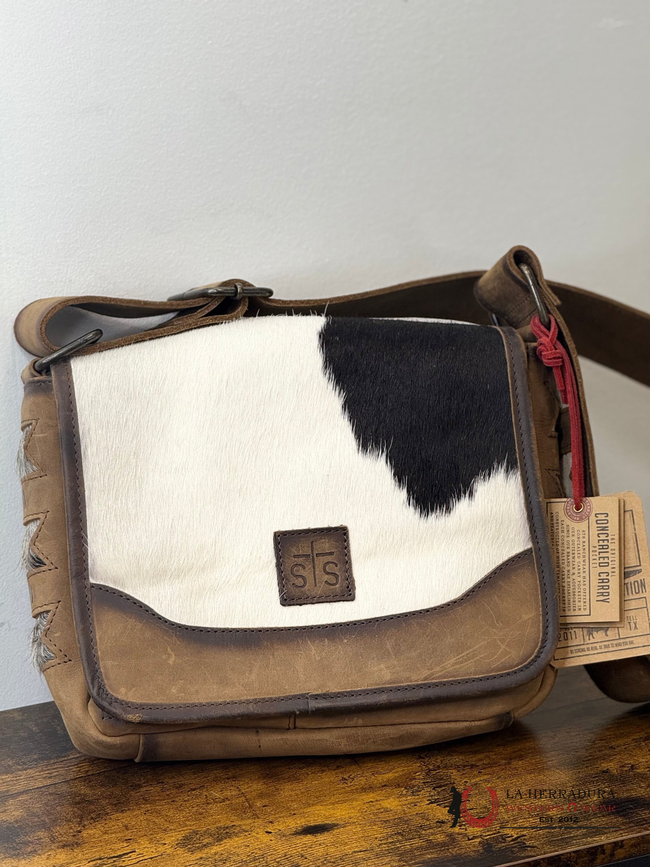 STS 32688 RANCHWEAR COWHIDE BLACK & WHITE/TAB ROSEELL