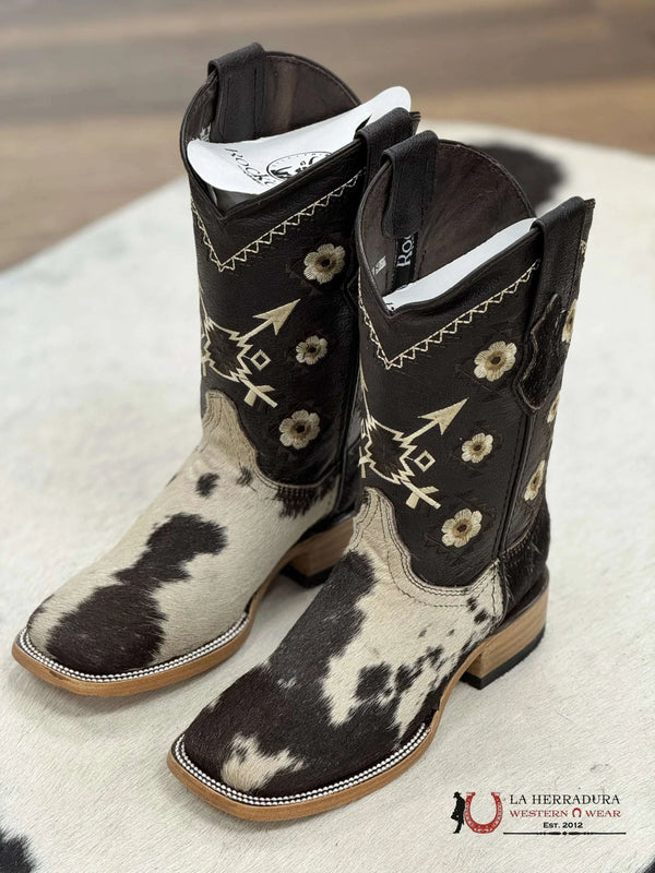 CEDONA DE MUJER EN PIEL DE VACA BLANCA Y NEGRA (CADA PAR ES ÚNICO)